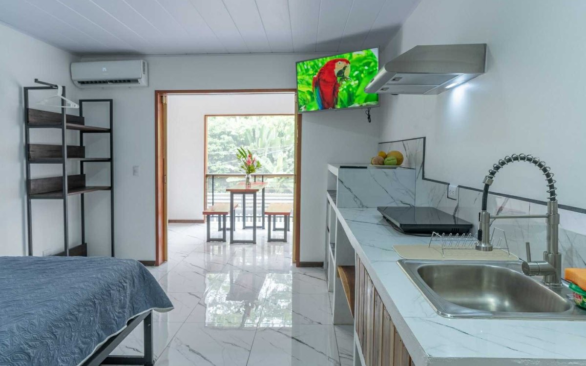 Front studio balcony with jungle view